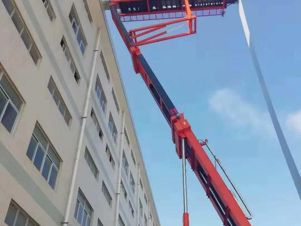 Elevated platform reaching a steel building roofline
