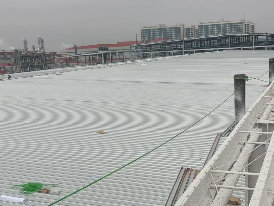 Corrugated metal roof panels after roof-level forming